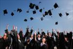 students celebrating better housing